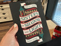 Sisters of shadow and light
